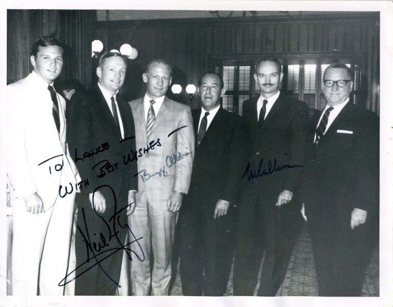 Item #13358 Apollo 11 Signed Photo by all three taken on their first evening out of quarantine After their Return to Earth. Apollo 11.