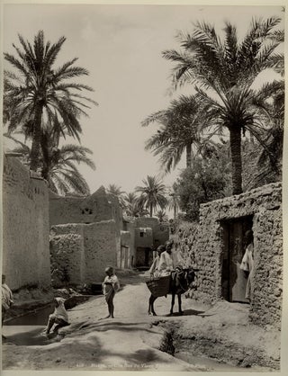 Item #14065 Photo of Arabian Ruins and Men with Donkey, Circa 1890s. Photograph Arabia