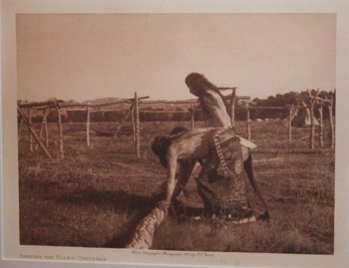 Item #14207 Edward S. Curtis original 1910 photogravure "Painting Poles-Cheyenne" Edward Sheriff Curtis.