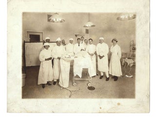 Item #16208 Women Surgeons at Work at the turn of the century. Women Surgeons