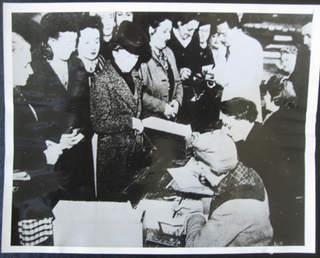 Item #16533 Women in Paris register to vote for the first time, 1945. International Suffrage, France