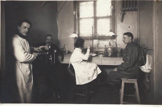 Item #16668 Woman Lab Technician Works Alongside Men, c. 1917. Women in Science, Original photograph