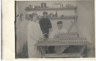 Item #16672 Original photograph of a Early Laboratory with Female Technician, c. 1910. Women in...