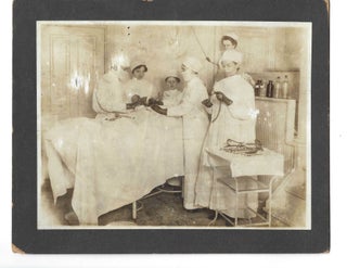 Item #16872 Woman Surgeon and Medical Team Perform Operation circa 1920. Women Medicine, Surgery