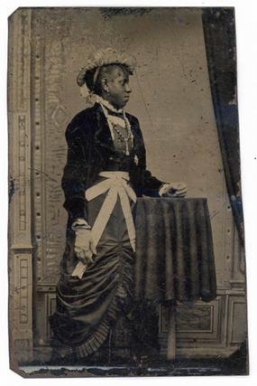 Item #18631 Tintype Photograph of Well-Dressed African American Woman. Tintype African American