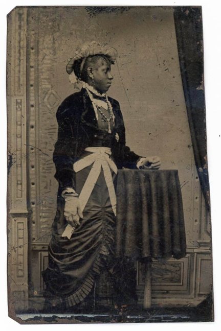 Item #18631 Tintype Photograph of Well-Dressed African American Woman. Tintype African American.
