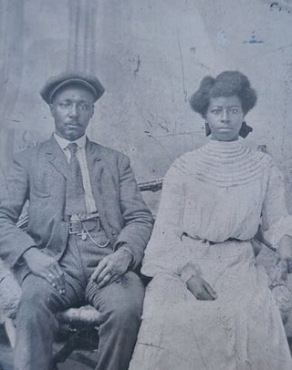 Item #18943 Tintype of African American Couple Sitting on a Loveseat. Photograph African American