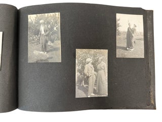 Gender Play and Military Family Life in a World War I Era Minnesota Photo Album,of 190 Photographs, include women in men suits and military garments, while men pose in dresses, skirts, and frilled hats - 1917-1922